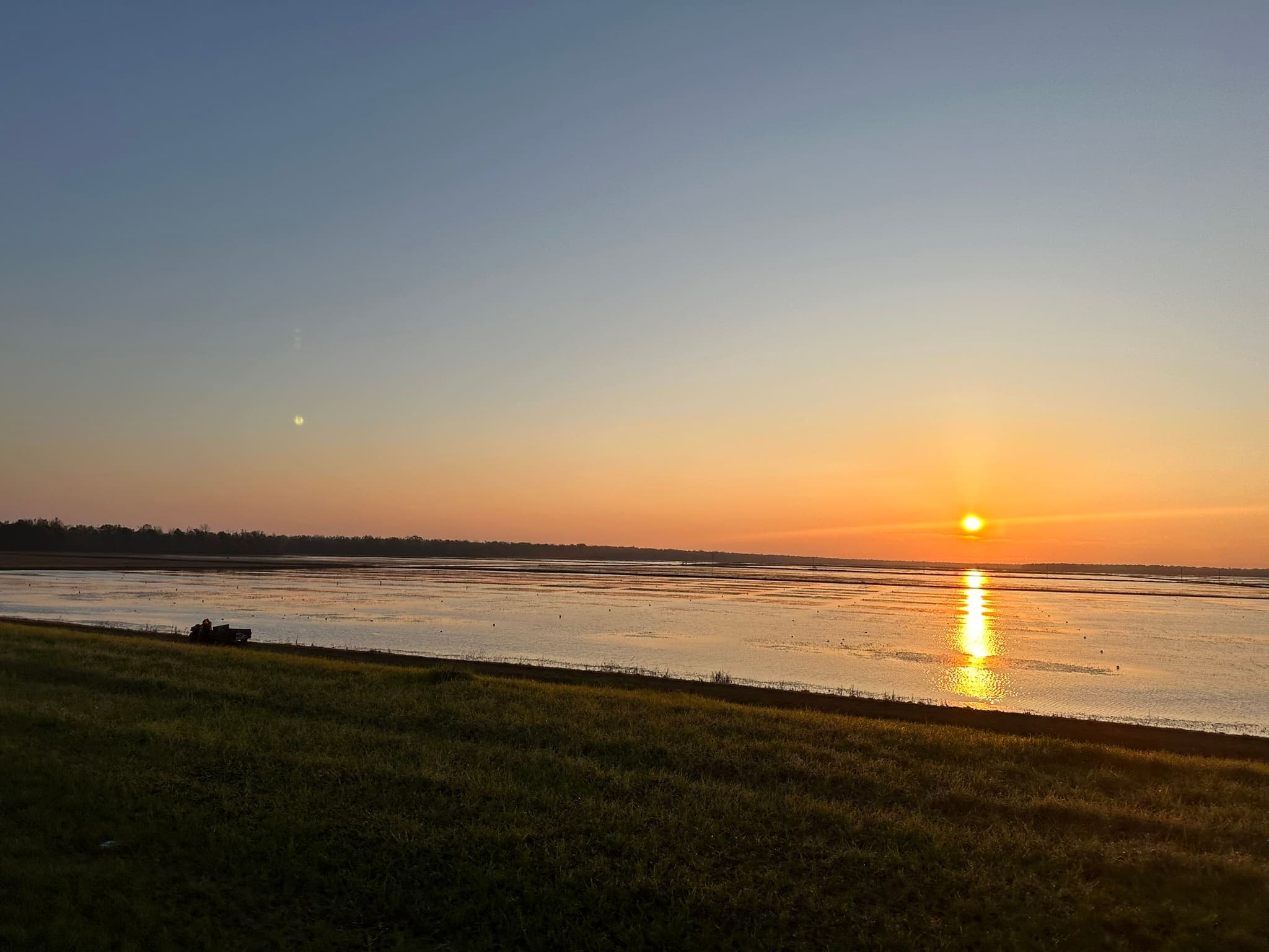 Sunset over the flooded crawfish ponds at Ju's Crawfish Company in Plaucheville, Louisiana